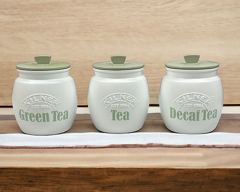 White tea coffee sugar canisters with sage green lids and green tea tea and decaf tea in sage green wording on the canisters get your own set of canisters with your own choice of wording on them