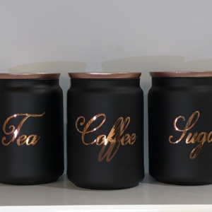 Black Tea Coffee Sugar Canister Set Shown with Rose Gold Lids